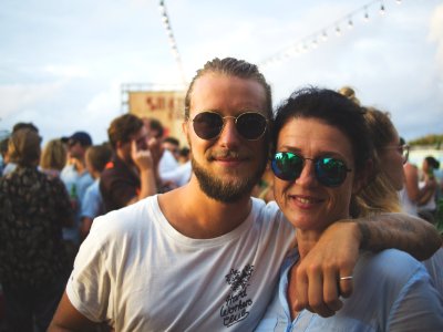 man and woman smiling on focus photography photo