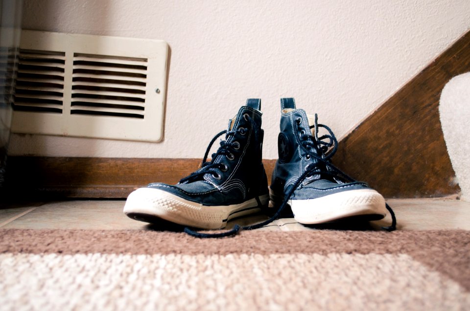 pair of blue high-top sneakers