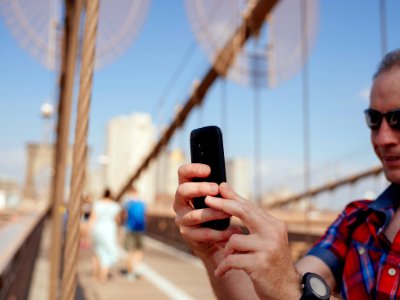 man holding smartphone