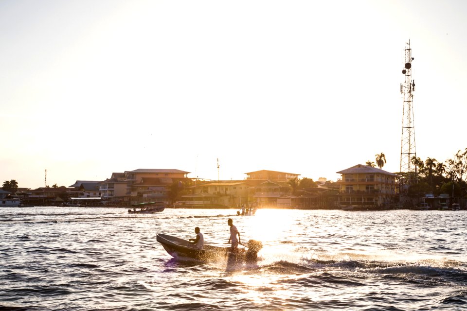 man riding on boat on water during daytime