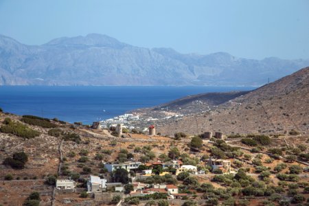 aerial view of city near body of water during daytime photo