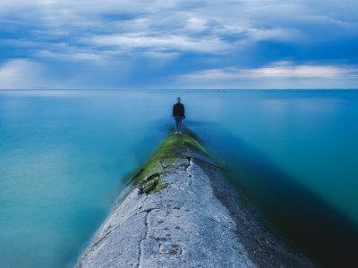 A man standing above water 