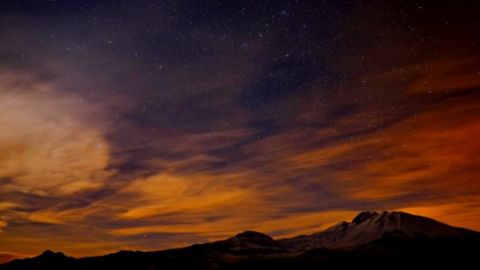 A mountain under the stars photo