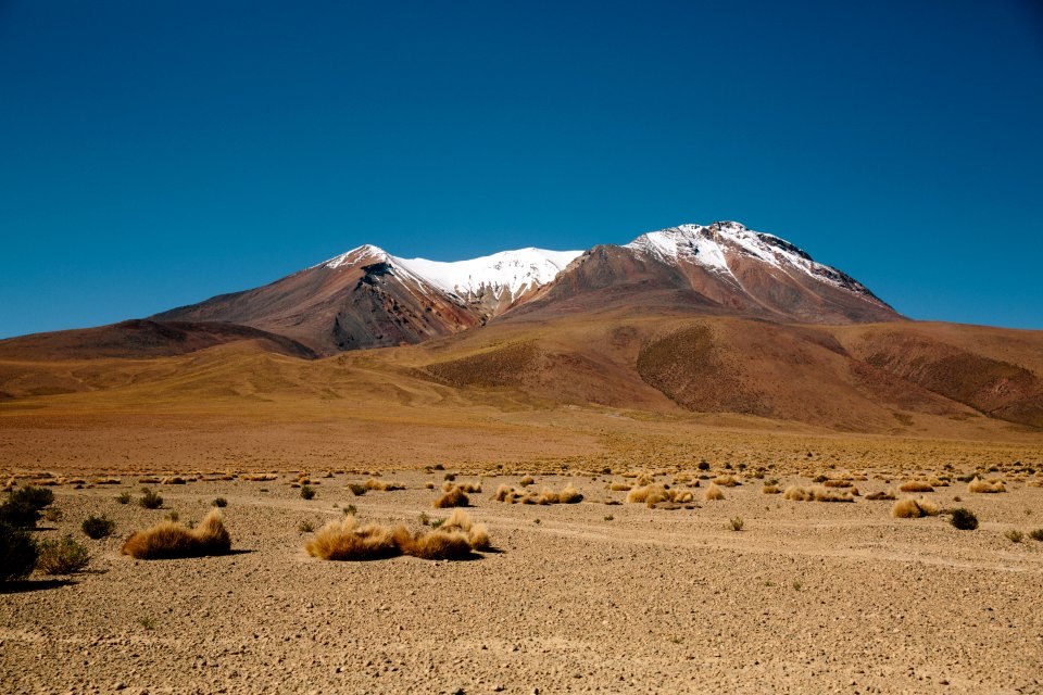 A snowy mountain in the desert 