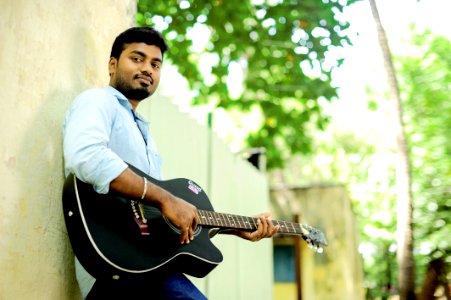 Acoustic guitar player in Chennai 