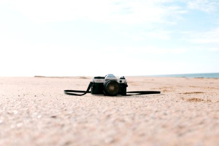 Analog SLR Camera on beach 