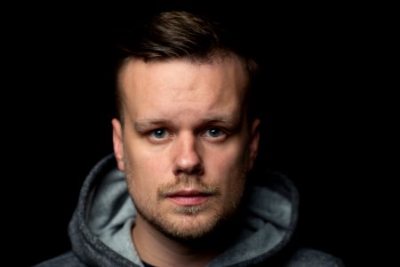 Bearded man in hoodie 