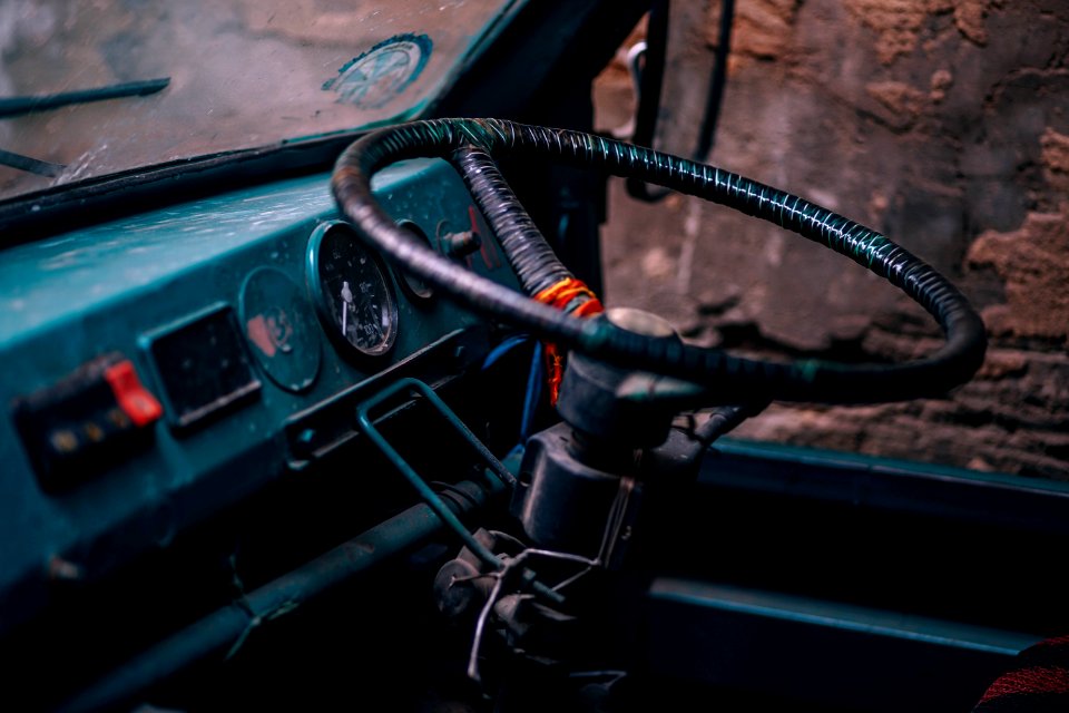 Blue car dashboard and wheel 