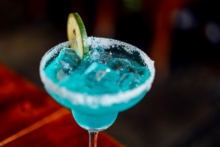 Blue cocktail with lime 