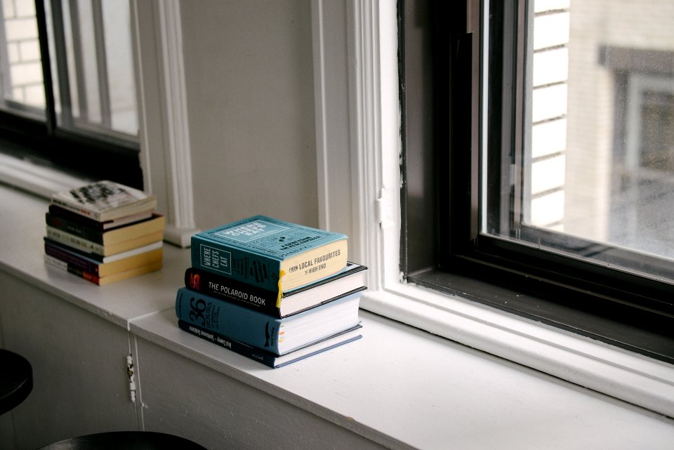 Books on a window ledge 
