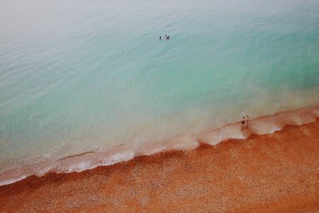 Drone view of red sand beach photo