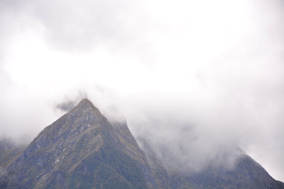 Fog-shrouded mountain 