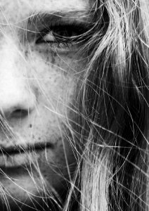 Freckles on dutch girl face photo