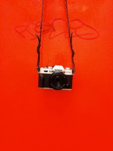 Hanging by a strap 