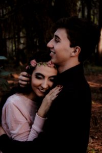 Happy young couple cuddling 