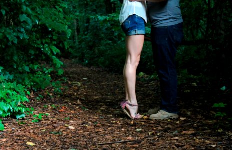 Pausing for a kiss on a hike 