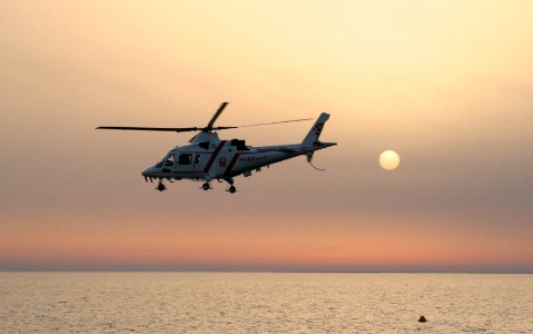 Police helicopter at sunset 