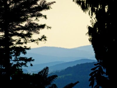 Sunset over green hills 