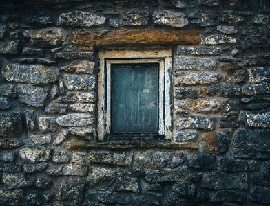 Old stone wall window photo