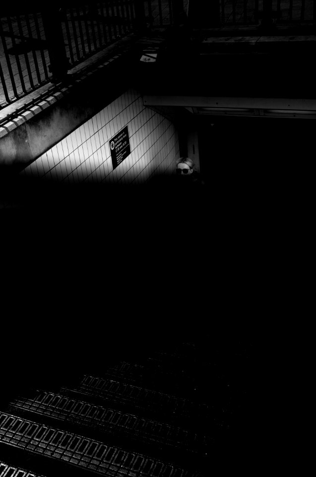 Woman exiting metro in London photo