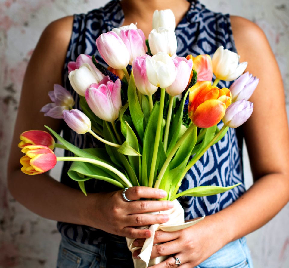Woman holding a bouquet of tulips (Rawpixel.com Unsplash pgi0LPOM FI) 