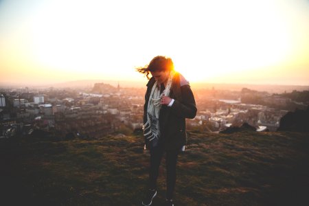 Woman on hilltop 