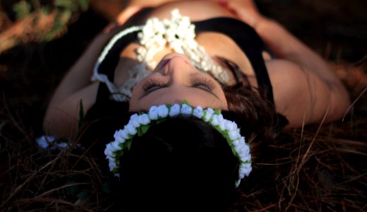 Woman with flower headband photo