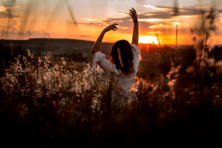 Woman yoga pose sunrise 