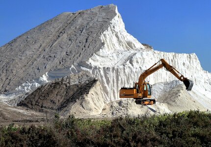 Salt mountain excavators transport