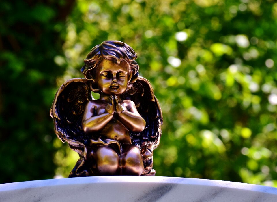 Guardian angel pray sculpture