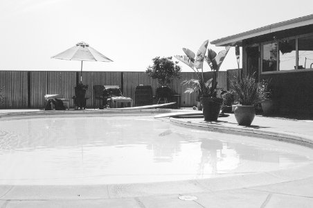 Grayscale Photography of Swimming Pool