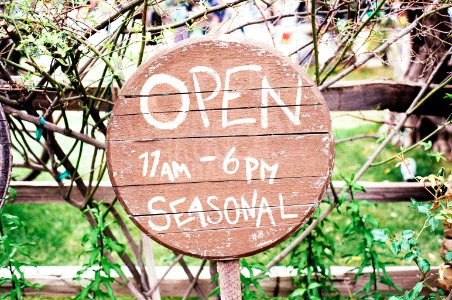 Brown and White Open Signage photo