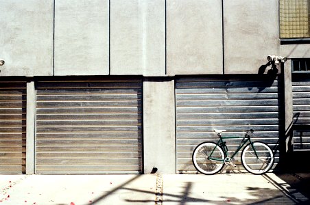 Green Bike Near Roll-up Door photo