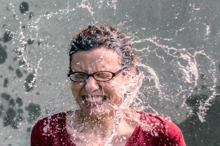 Water Splashing to Woman's Face