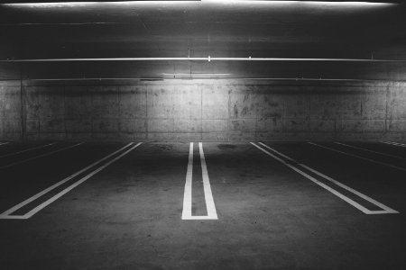 Grayscale Photography of Empty Parking Lot photo