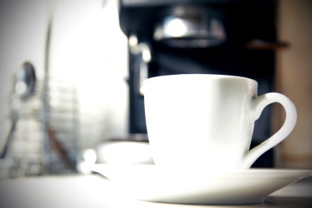 White Ceramic Coffee Mug With Saucer photo