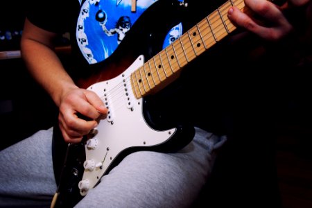 Man Performing Guitar photo