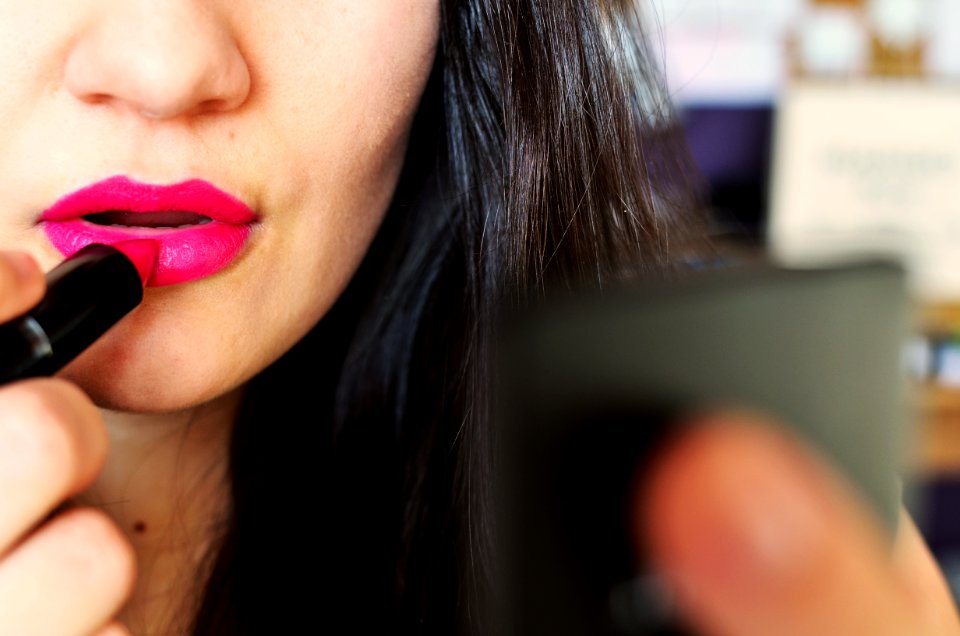 Woman Put Lipsticks