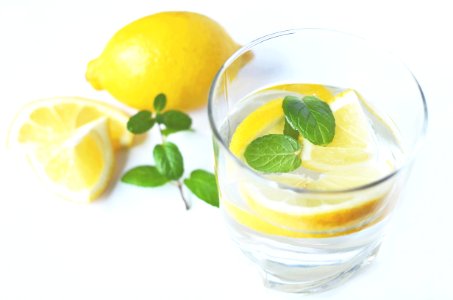 Clear Drinking Glass With Slice Lemon