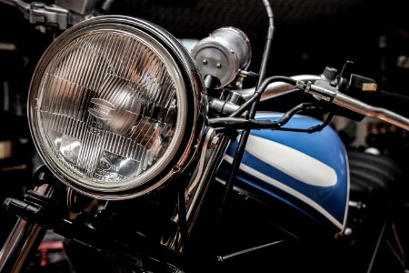 Close-up Photography of Blue and Black Standard Motorcycle photo