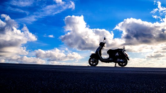 Silhouette Photography of Automatic Motor Scooter photo