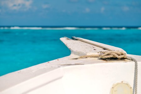 White Boat on Body of Water photo