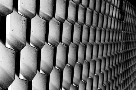 Grayscale Photography of Metal Cutout Wall photo