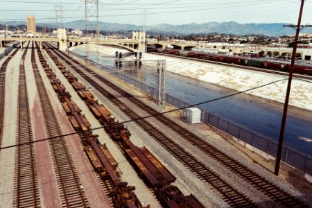 Photography of Train Rails Under Bridge photo