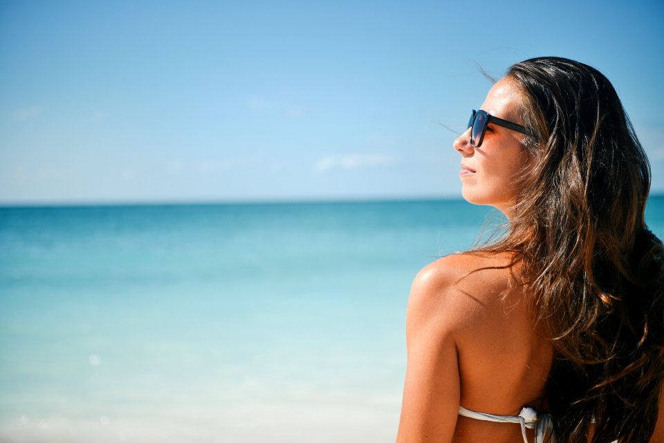 Woman Standing on Seashore photo