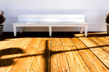 White Wooden Bench in Front of White Wall photo