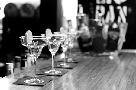 Grayscale Photography of Margarita Glass on Table photo