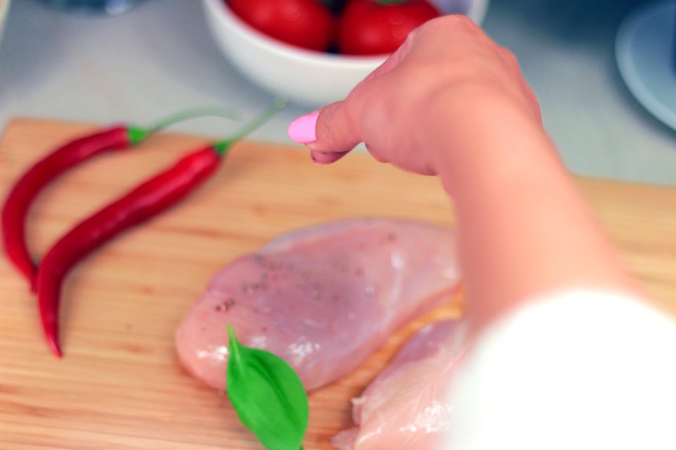 Person Pouring Condiment photo