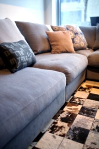 Comfortable grey couch with pillows photo