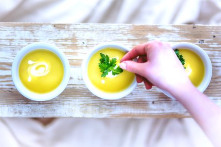 Leek and potato soup / hand photo